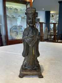 A Chinese bronze figure of an official, Ming