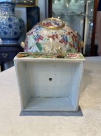 A rare pair of Chinese Canton famille rose export urns, 19th C.