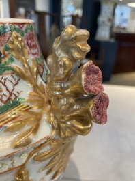 A rare pair of Chinese Canton famille rose export urns, 19th C.