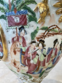 A rare pair of Chinese Canton famille rose export urns, 19th C.