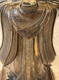 A Chinese bronze figure of an official, Ming