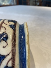 A blue, white and manganese Portuguese faience albarello, 17th C.