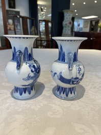 A pair of Chinese blue and white vases, a pair of sancai Buddhist lions, a famille rose ewer and a teapot, 19th C.