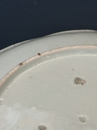A Japanese Hizen ware Kakiemon-style 'riverside landscape' plate, Edo, 17/18th C.