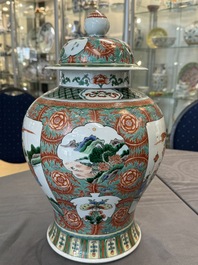 A pair of Chinese famille verte 'Wen Wang Fang Xian 文王訪賢' vases and covers, 19th C.