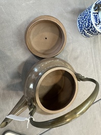 A Chinese polished purple Yixing stoneware covered teapot for the Thai market and a blue and white covered teapot, 19th C.