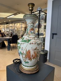 A Chinese famille verte vase, two famille rose jars and three covered jars, 19th C.