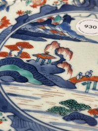 A Japanese Hizen ware Kakiemon-style 'riverside landscape' plate, Edo, 17/18th C.