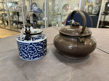 A Chinese polished purple Yixing stoneware covered teapot for the Thai market and a blue and white covered teapot, 19th C.