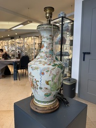 A Chinese famille verte vase, two famille rose jars and three covered jars, 19th C.