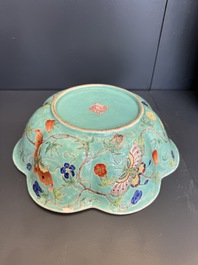 A set of 14 Chinese turquoise-ground famille rose dinner service, Qianglong mark, 19th C.