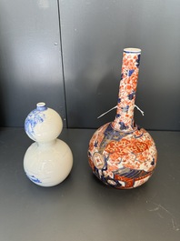 A Japanese blue and white gourd vase, an Imari bottle vase and a set of five Satsuma cups, 19th C.