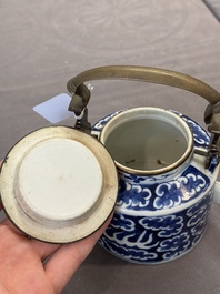 A Chinese polished purple Yixing stoneware covered teapot for the Thai market and a blue and white covered teapot, 19th C.