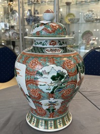 A pair of Chinese famille verte 'Wen Wang Fang Xian 文王訪賢' vases and covers, 19th C.
