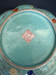 A set of 14 Chinese turquoise-ground famille rose dinner service, Qianglong mark, 19th C.