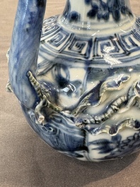 A fine Chinese blue and white 'pomegranate' kendi and a wooden cover, Wanli