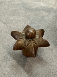A fine Chinese blue and white 'pomegranate' kendi and a wooden cover, Wanli