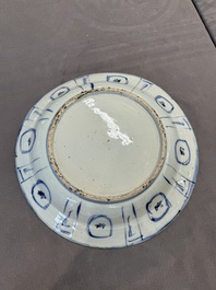 A Chinese blue and white kraak porcelain dish with birds among blossoming branches, Wanli