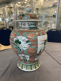 A pair of Chinese famille verte 'Wen Wang Fang Xian 文王訪賢' vases and covers, 19th C.