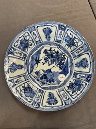 A Chinese blue and white kraak porcelain dish with birds among blossoming branches, Wanli