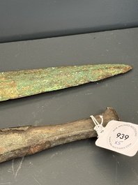 Four bronze daggers and a sword, Luristan and Syria, 1st C. B.C.