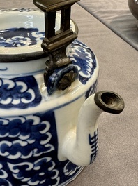 A Chinese polished purple Yixing stoneware covered teapot for the Thai market and a blue and white covered teapot, 19th C.