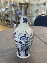 A Chinese blue and white silver-mounted vase with floral design, Kangxi