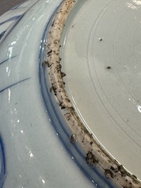A Chinese blue and white kraak porcelain dish with birds among blossoming branches, Wanli