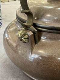 A Chinese polished purple Yixing stoneware covered teapot for the Thai market and a blue and white covered teapot, 19th C.