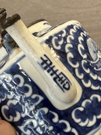 A Chinese polished purple Yixing stoneware covered teapot for the Thai market and a blue and white covered teapot, 19th C.