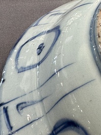 A Chinese blue and white kraak porcelain dish with birds among blossoming branches, Wanli