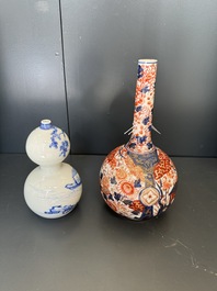 A Japanese blue and white gourd vase, an Imari bottle vase and a set of five Satsuma cups, 19th C.