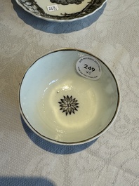 Two Chinese export grisaille cups and saucers and a plate, Qianlong