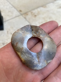 A collection of 16 Chinese neolithic jade 'bi' discs, probably Shang