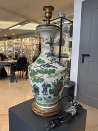 A Chinese famille verte vase, two famille rose jars and three covered jars, 19th C.