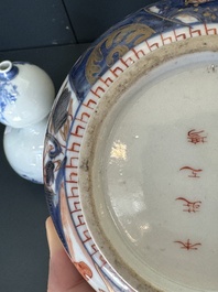 A Japanese blue and white gourd vase, an Imari bottle vase and a set of five Satsuma cups, 19th C.