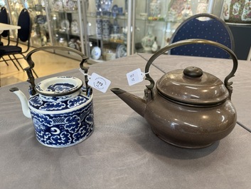 A Chinese polished purple Yixing stoneware covered teapot for the Thai market and a blue and white covered teapot, 19th C.
