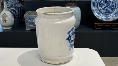 A large Dutch Delft blue and white albarello, inscribed 'Corenten', 18th C.