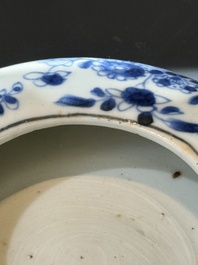 A Chinese porcelain spittoon, two walking stick knobs, five knife handles, Kangxi/Qianlong