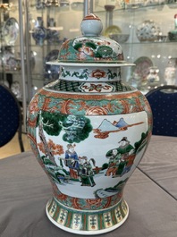 A pair of Chinese famille verte 'Wen Wang Fang Xian 文王訪賢' vases and covers, 19th C.