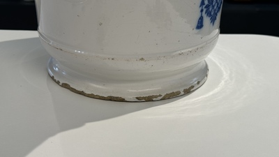 A large Dutch Delft blue and white albarello, inscribed 'Corenten', 18th C.