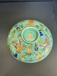 A set of 14 Chinese turquoise-ground famille rose dinner service, Qianglong mark, 19th C.