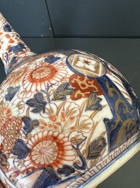 A Japanese blue and white gourd vase, an Imari bottle vase and a set of five Satsuma cups, 19th C.