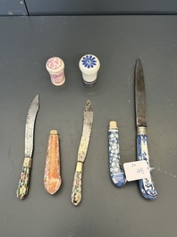 A Chinese porcelain spittoon, two walking stick knobs, five knife handles, Kangxi/Qianlong