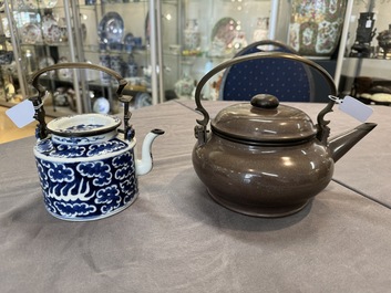 A Chinese polished purple Yixing stoneware covered teapot for the Thai market and a blue and white covered teapot, 19th C.