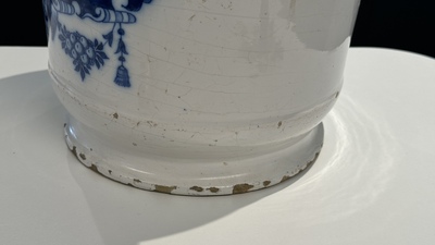 A large Dutch Delft blue and white albarello, inscribed 'Corenten', 18th C.