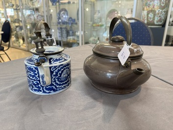 A Chinese polished purple Yixing stoneware covered teapot for the Thai market and a blue and white covered teapot, 19th C.