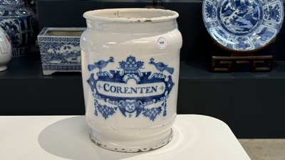 A large Dutch Delft blue and white albarello, inscribed 'Corenten', 18th C.