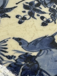A Chinese blue and white kraak porcelain dish with birds among blossoming branches, Wanli