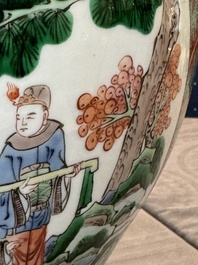 A pair of Chinese famille verte 'Wen Wang Fang Xian 文王訪賢' vases and covers, 19th C.